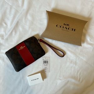 Never worn NWT Coach wristlet